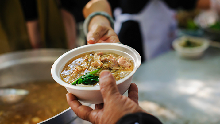Feeding,The,Poor,To,Hands,Of,A,Beggar.,Poverty,Concept